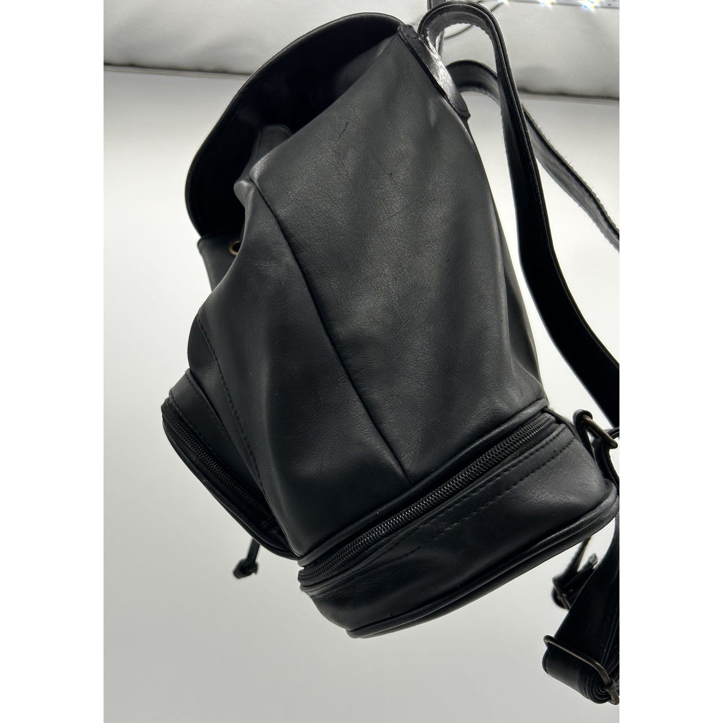 Black leather duffle backpack with pockets