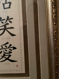 Asian ‘Live Laugh Love’ signed picture