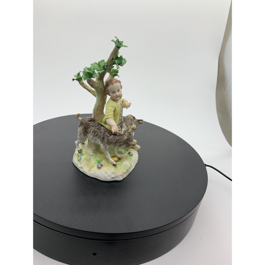 marked porcelain figurine of Shepard with goats in forest