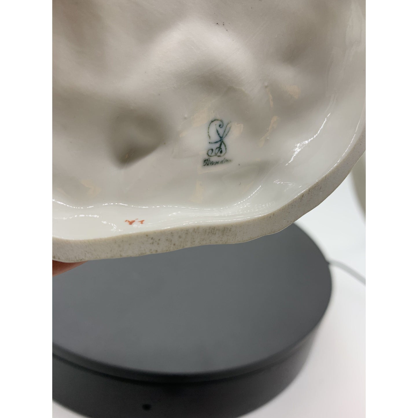 marked porcelain figurine of Shepard with goats in forest