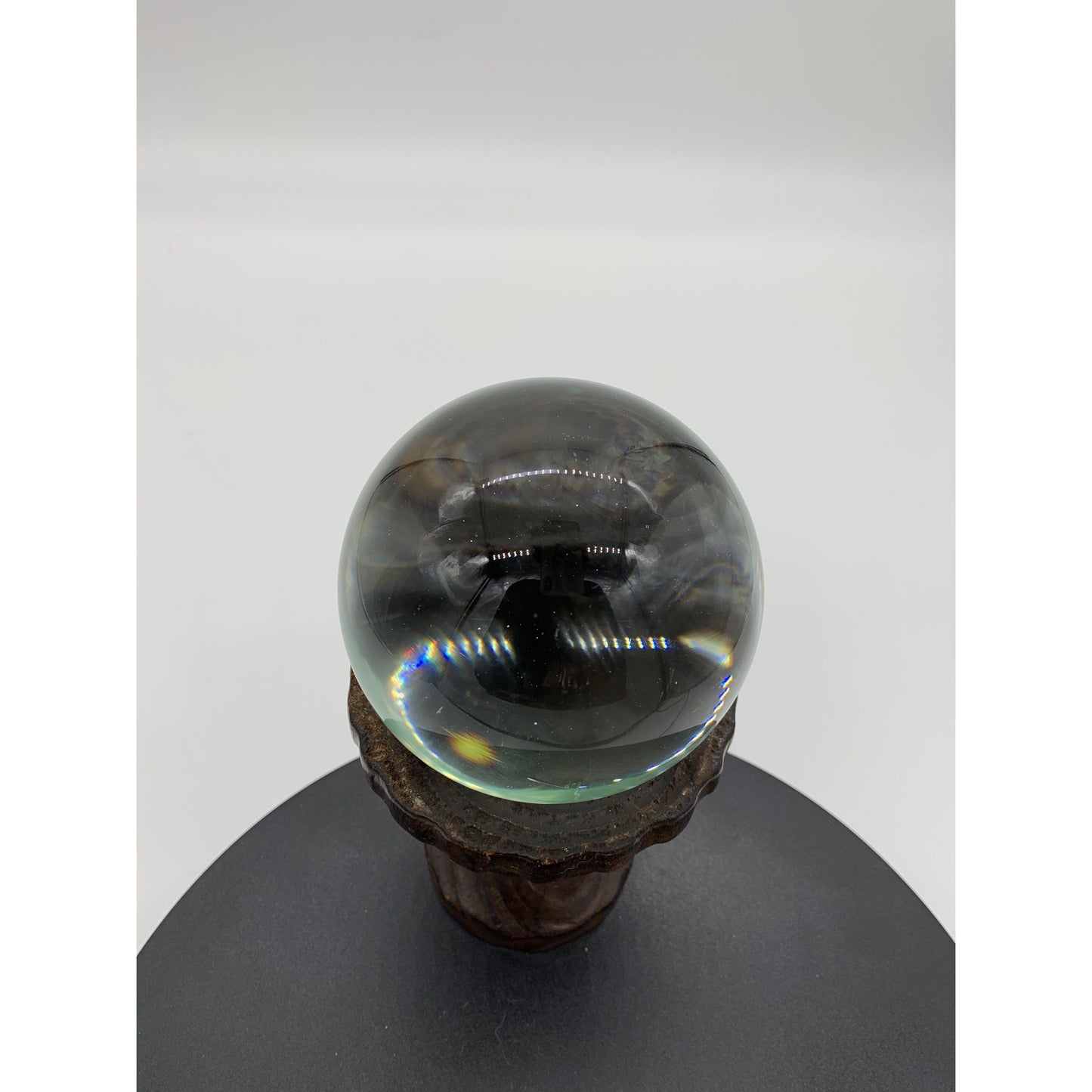 Crystal Ball on Wooden Pedestal