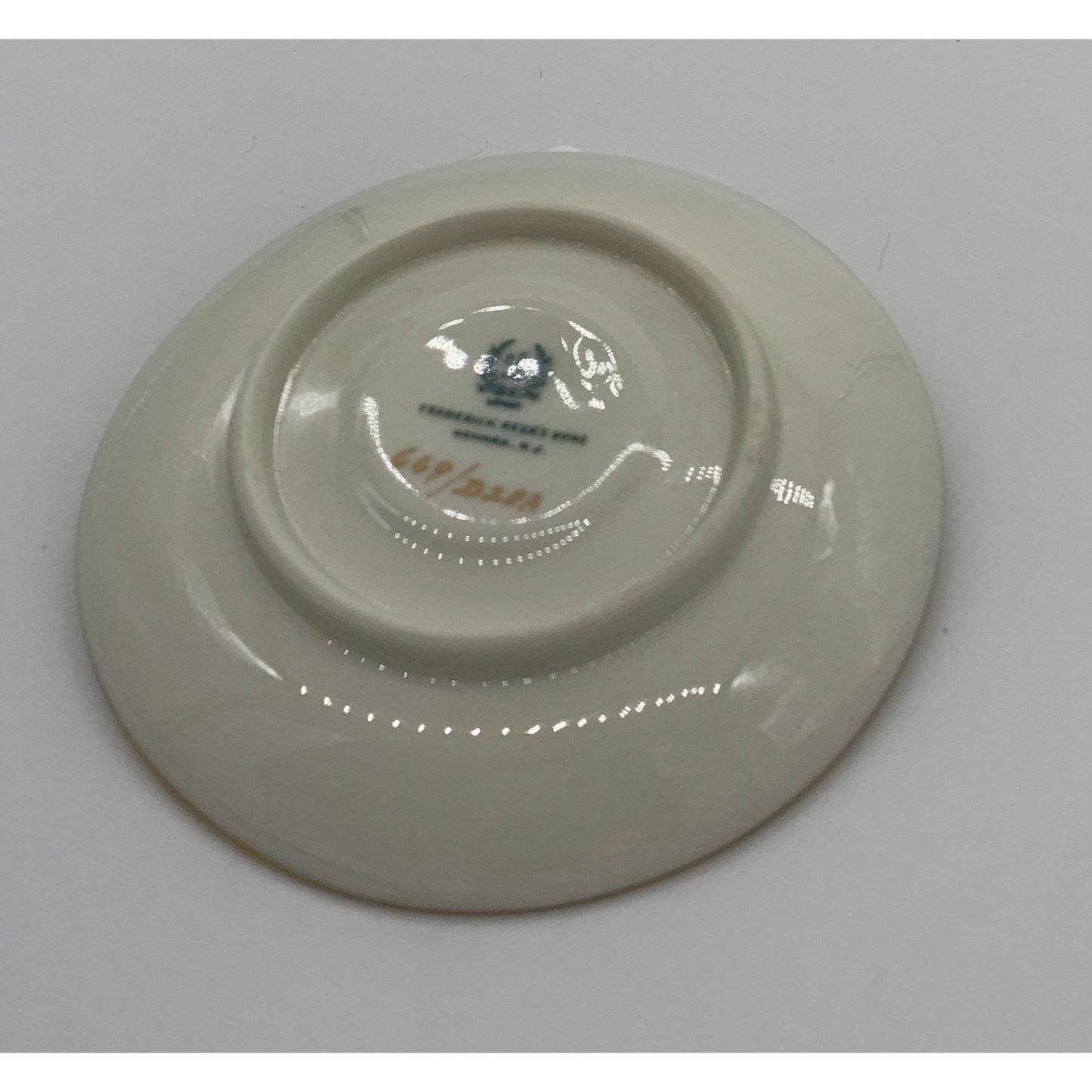 Small Decorative Ivory Plate with Star. Numbered and marked
